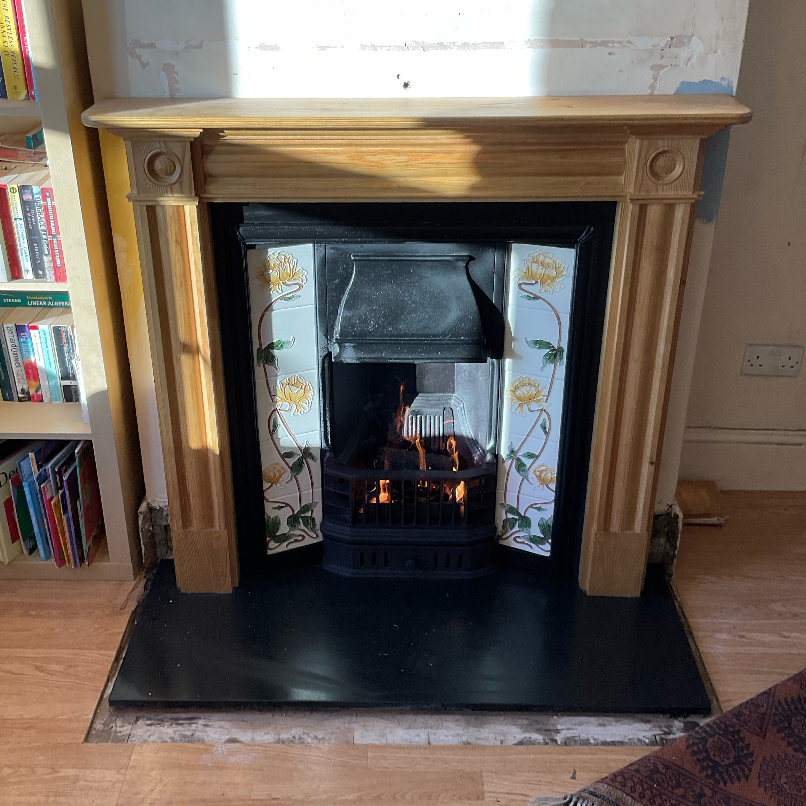 Wooden "Roundel" mantel, tiled insert, gas fire